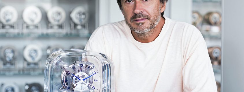 Marc Newson with the Jaeger-LeCoultre Atmos 568 he designed