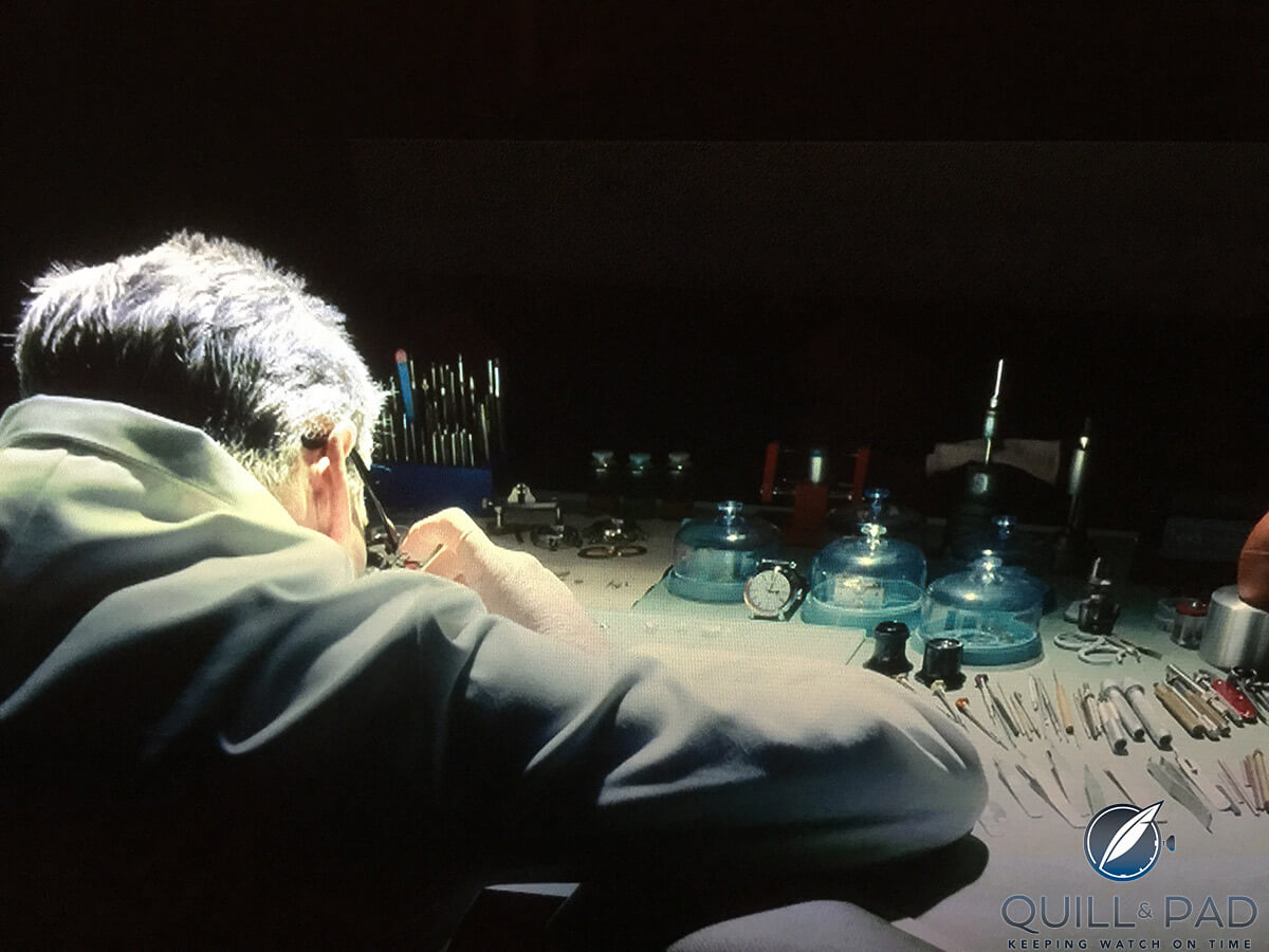 Pierce Brosnan in his role as a watchmaker in the film Survivor (note the Speake-Marin on the bench)