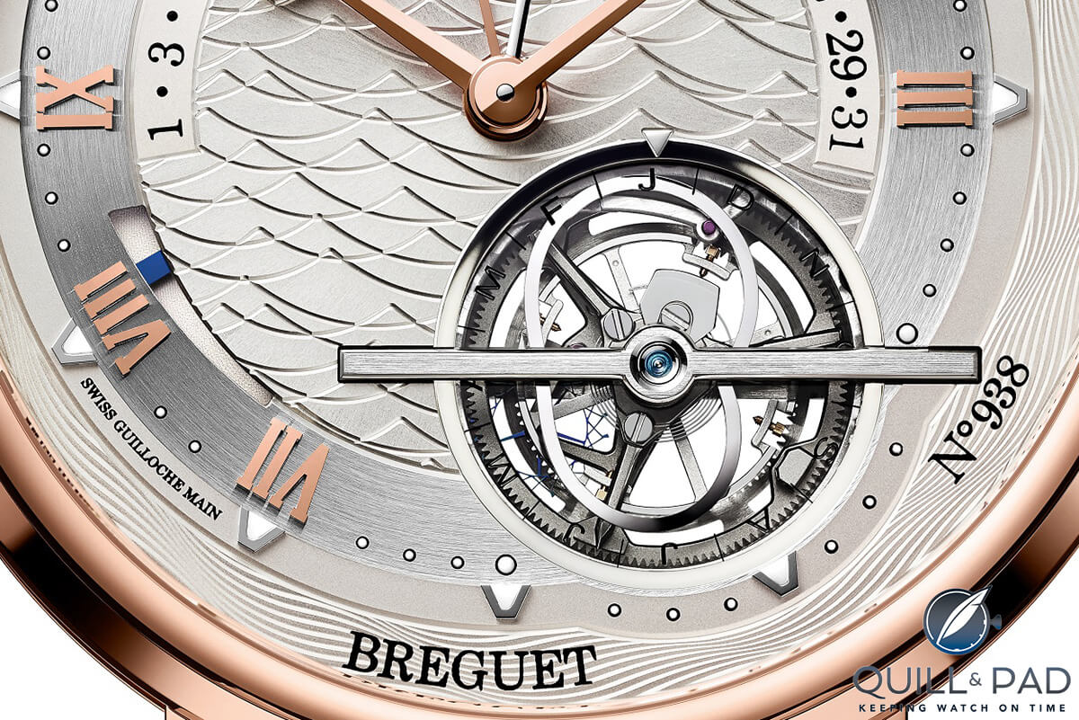 Peanut shaped equation of time track over the tourbillon on the Breguet Marine Équation Marchante with the small ruby tracking pin just visible at 1 o'clock inside the track