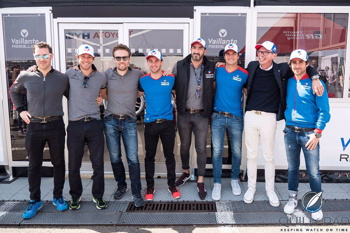 Roland Iten (second from right) and the Rebellion Racing team all wearing Roland Iten for Rebellion RR782 Flyback Pilot belt buckles