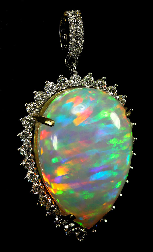 20.05 carat Ethiopian Welo (Wello) opal set in 14k gold and surrounded by diamonds (photo courtesy Doxymo/Wikipedia)