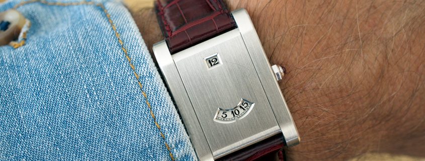 Cartier Tank à Guichets in platinum on the wrist
