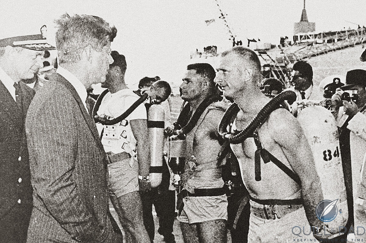 Then American president John F. Kennedy (JFK) speaking with US Navy Seal-divers wearing Blancpain Fifty-Fathoms watches