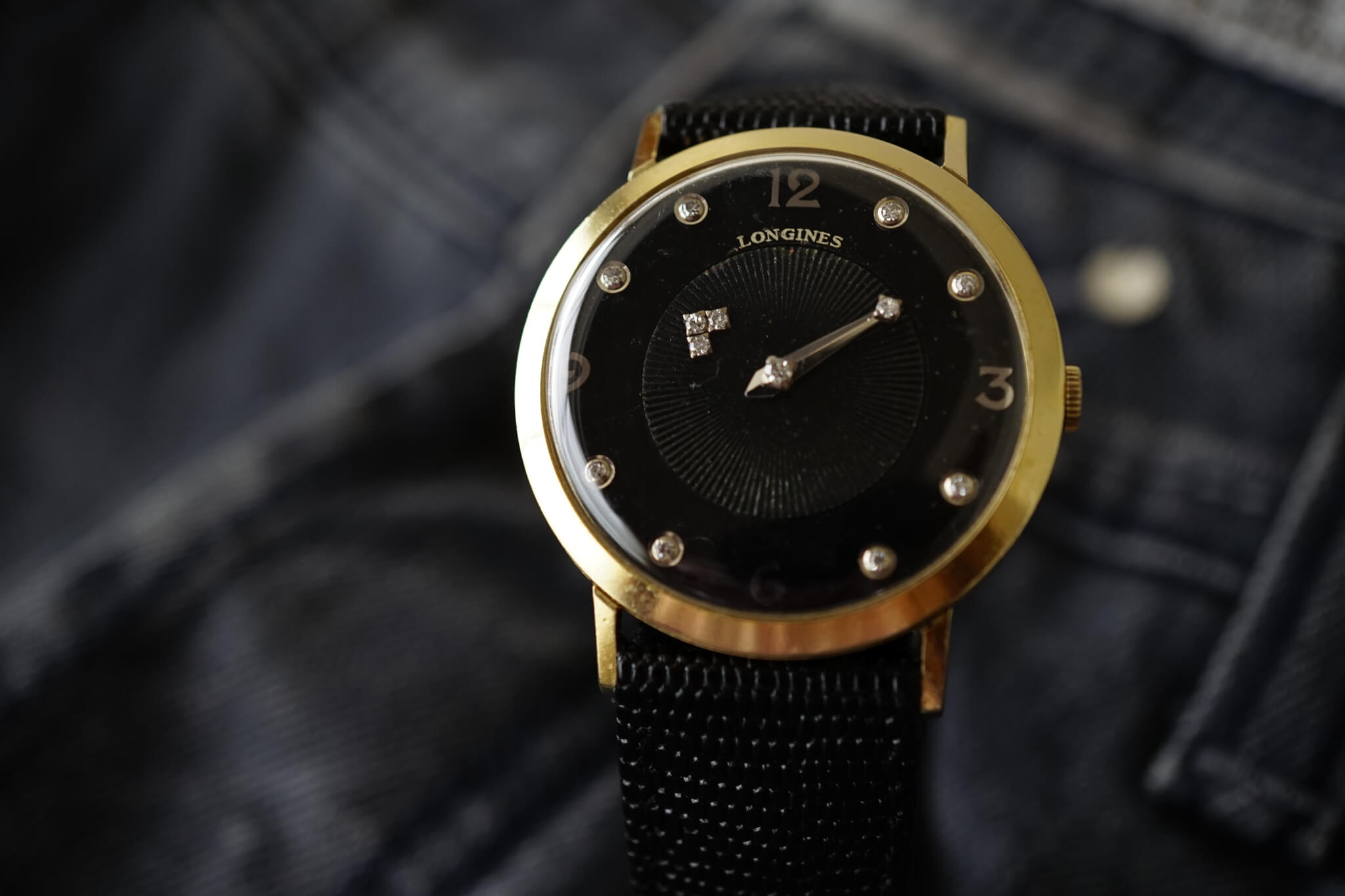 Vintage Longines Mystery watch with black dial