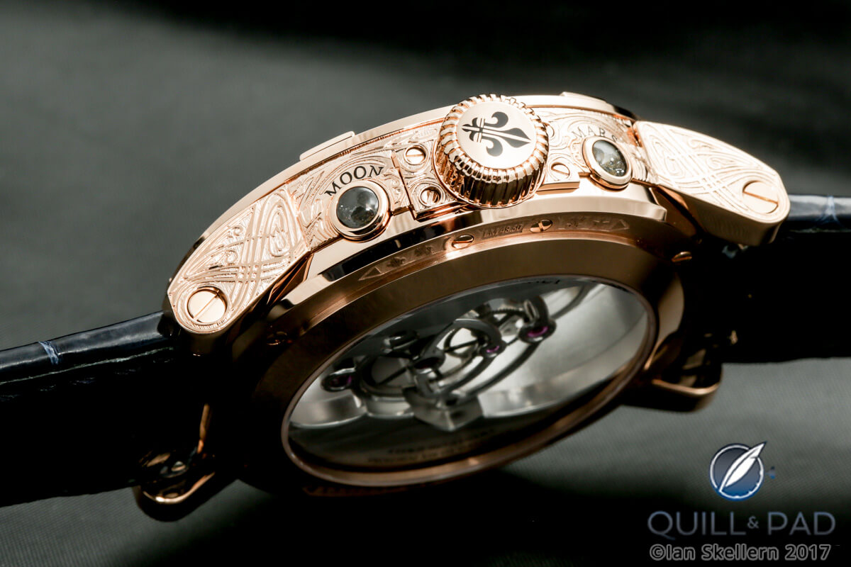 Crown and setting pushers for the Moon and Mars on the caseband on this engraved Louis Moinet Space Mystery in pink gold