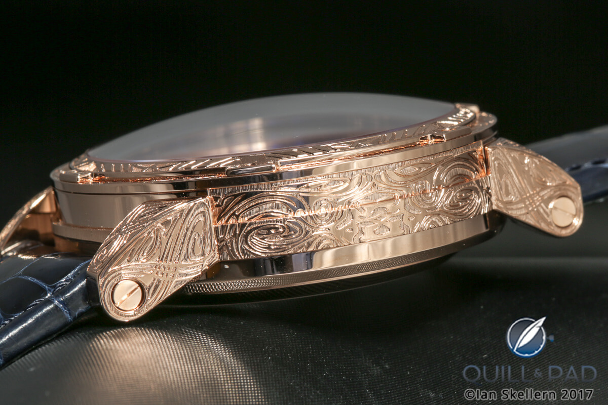 Intricately engraved caseband and lugs of the Louis Moinet Space Mystery in pink gold