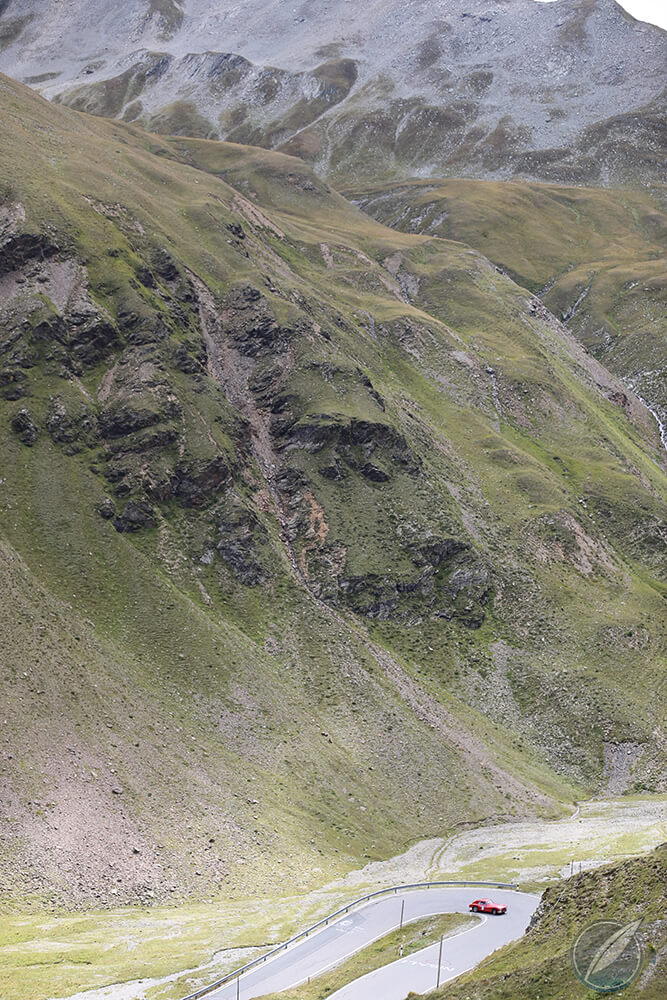 The car at the bottom of this image highlights the scale of the mountain passes in the 2017 Passione Engadina