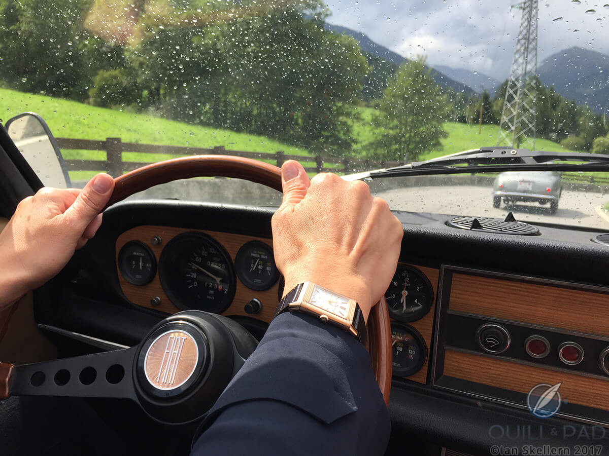 Nola wearing a Jaeger Le-Coultre Reverso Tribute Duoface in pink gold in the 2017 Passione Engadina rally