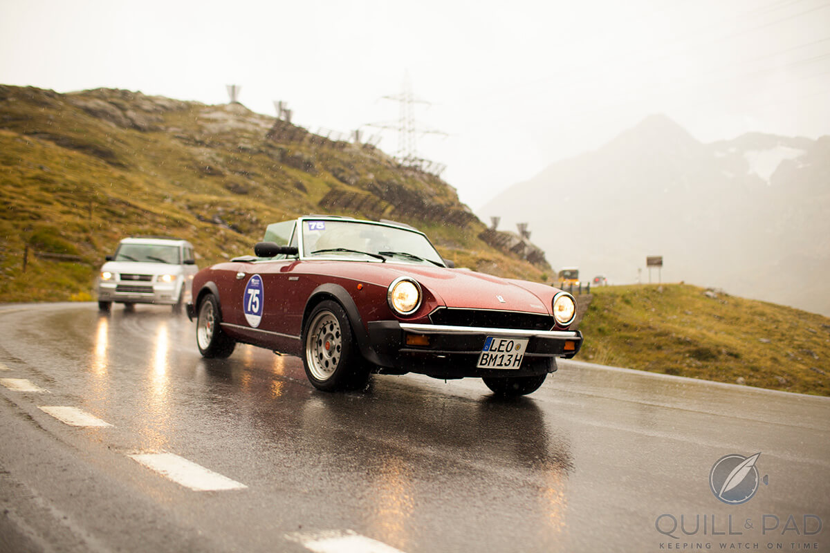 1985 Fiater 124 Spider Volumex driving through inclement weather on the 2017 Passione Engardina