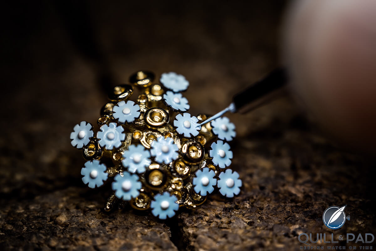 A bouquet of exquisite flowers being prepared for a dial on a Dior Grand Soir Botanic