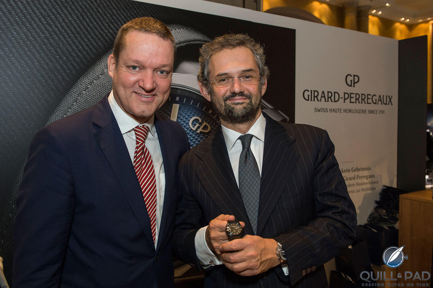 Girard Perregaux's Axel Felmy with Stefano Macaluso holding the Laureato Ceramic at Munichtime 2017