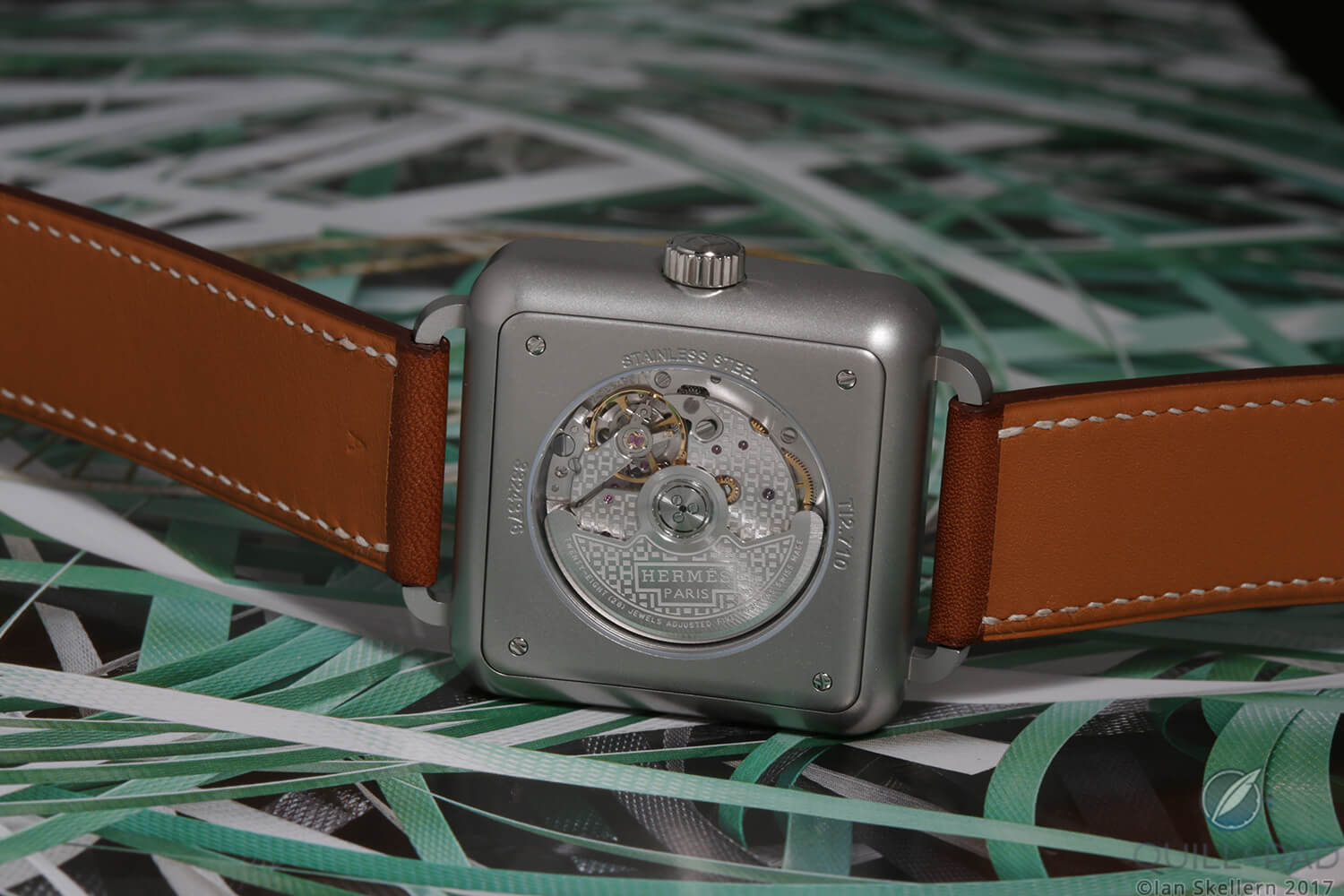 View through the display back of the Hermès Carré to the brand's own Caliber H1912 movement