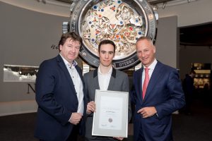 Timothé Raguin (center) with his F.A. Lange Watchmaking Excellence Award