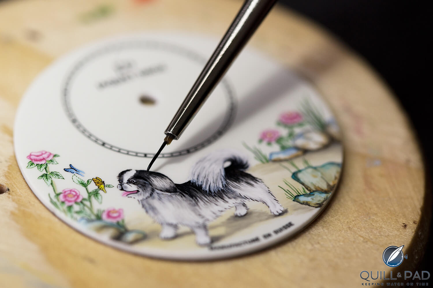 Miniature painting on the dial of the diamond-set Jaquet Droz Petite Heure Minute Dog