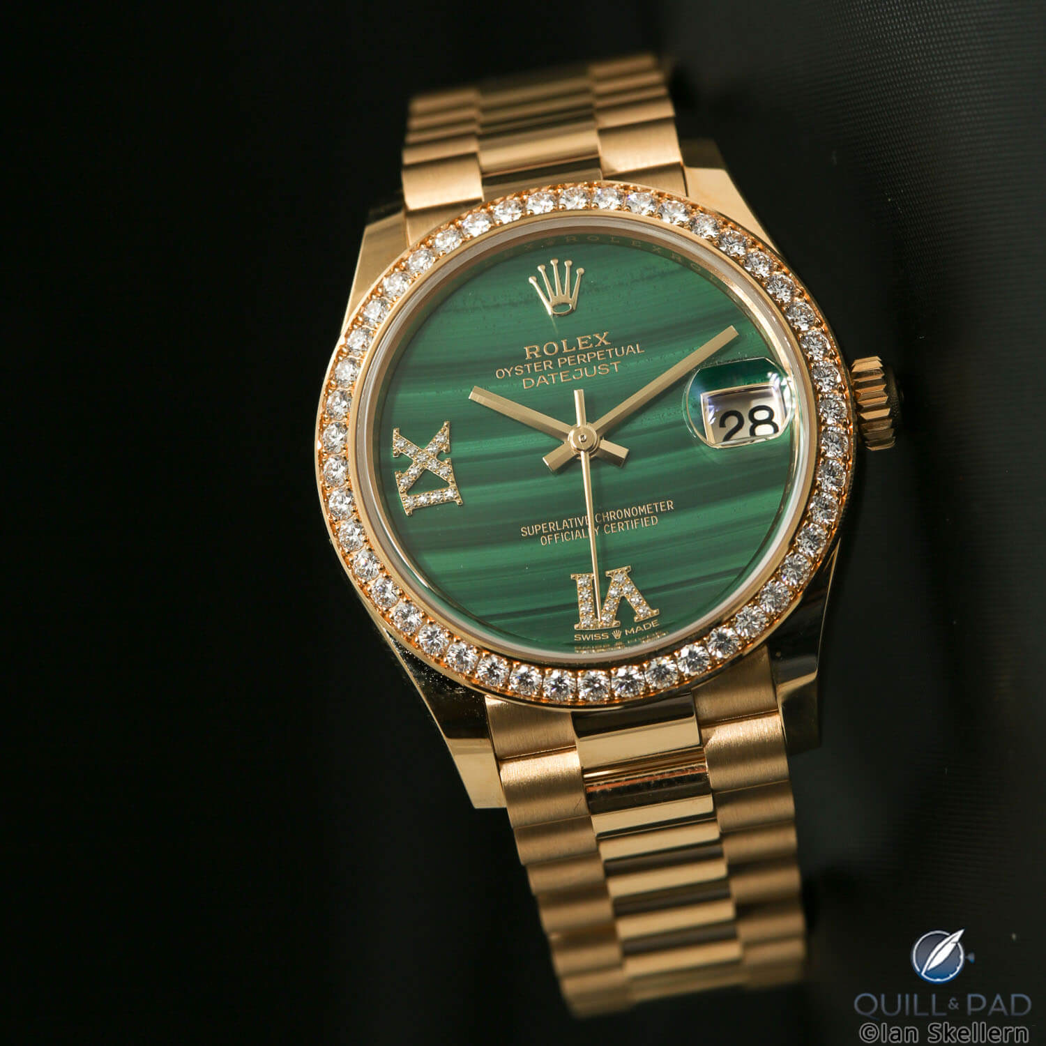 Rolex in gold with green dial