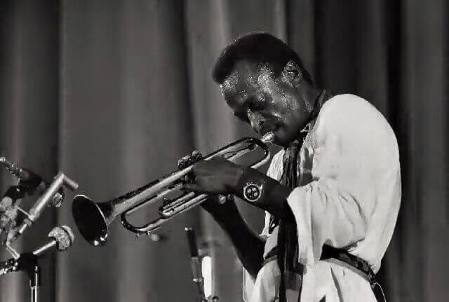 Miles Davis wearing a Breitling Navitimer Chronograph during a performance
