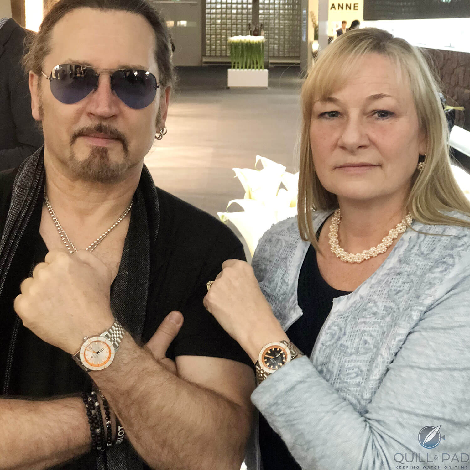 Kiss drummer Eric Singer and Quill & Pad editor Elizabeth Doerr wearing Zodiac Super Sea Wolf Topper Edition at Baselworld 2018