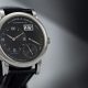 Lange 1 in stainless steel with black face