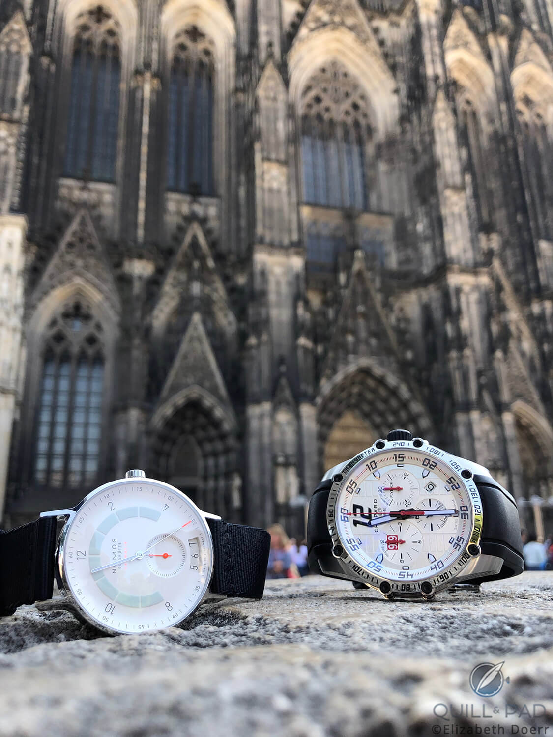 Nomos Glashütte Autobahn and Chopard Superfast Chrono Porsche 919 Edition in front of the Cologne Cathedral