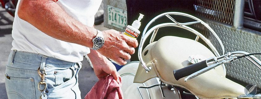Steve McQueen wearing a Rolex Submariner Reference 5513 with his Indian Chief motorcycle (photo courtesy Bonhams)