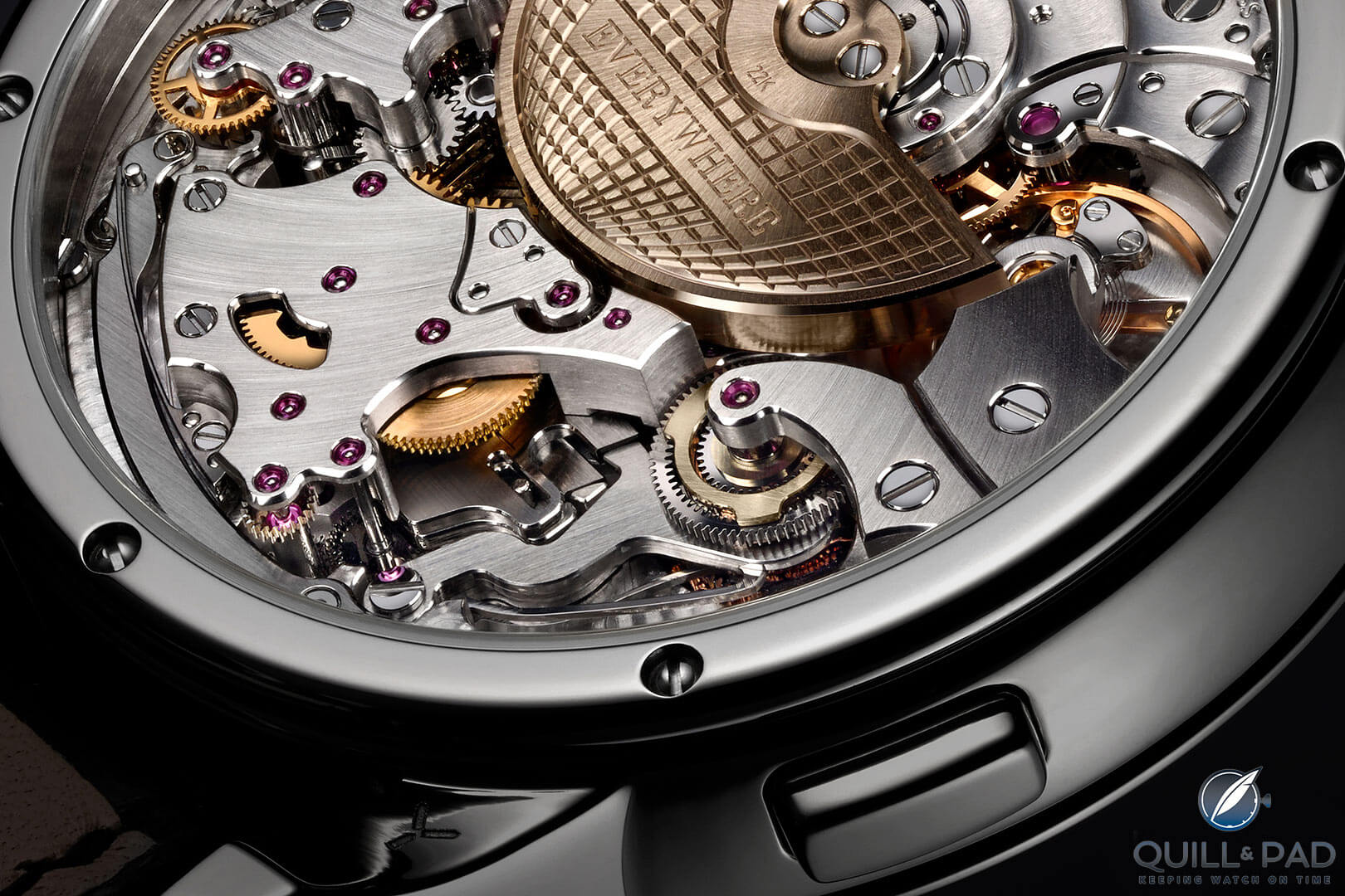 Clearly visible above the case band pusher at 5 o'clock are the stacked wheels on just one of four differentials in the Krayon Everywhere movement