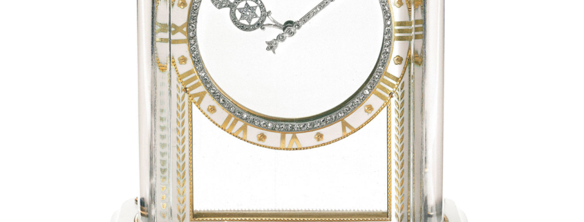 Model A Cartier Mystery Clock from 1912 featuring platinum, gold, white agate, rock crystal, sapphires, rose-cut diamonds, enamel